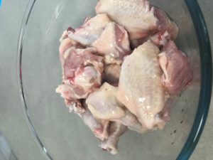 Kamado grilled chicken wings preparation